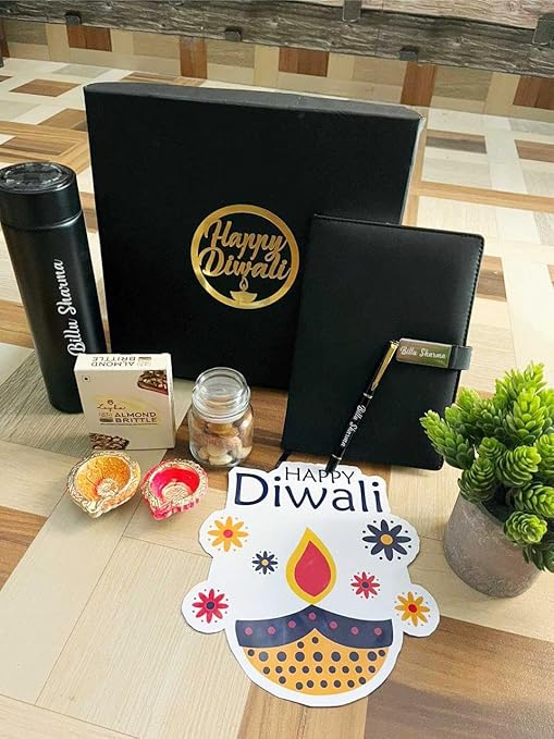 Diwali Gift Hamper - Personalized Dairy Pen, Insulated Bottle, Deepak Design, Chocolate, Golden Acrylic Laser-Cut 'Happy Diwali' Sticker, Cashew Almond Christmas Mix in Glass Bottle – Perfect Festive Gift Box (Black)